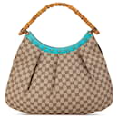 Sac hobo Gucci en toile GG marron avec clous en bambou