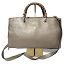 GUCCI Borsa Shopper Media in Pelle di Vitello Metallica a Righe Beige Dorato - Gucci