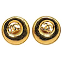 Boucles d'oreilles rondes clip-on en or plaqué Chanel CC doré