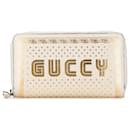 Portefeuille long en cuir blanc Gucci Guccy Sega avec fermeture éclair