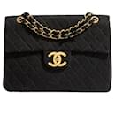 Bolsa Maxi Flap da Chanel