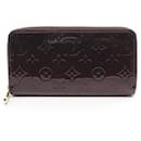 Portefeuille long en cuir violet Louis Vuitton