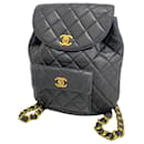 Sac à dos en cuir d'agneau matelassé noir Chanel