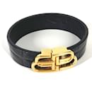 Pulseira de bangles preta e dourada Balenciaga 656827