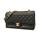 Bolsa de ombro em couro caviar preto Chanel