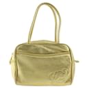 Loewe Anagram Handbag in Gold Leather