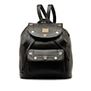 Mochila de couro preto com studs MCM