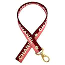 Sangle de cou Chanel en or, rose et rouge