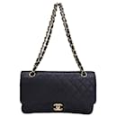 Chanel Medium Classic Double Flap Bag Quilted Caviar in Black Leather