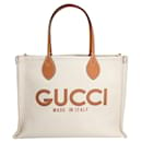 Borsa tote Gucci con stampa Gucci beige