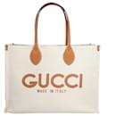 Borsa tote Gucci con stampa Gucci beige e marrone