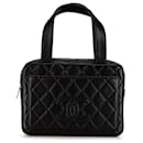 Sac à main en cuir d'agneau matelassé noir CC de Chanel