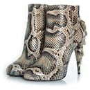 Roberto Cavalli, Python leather platform boots