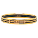 Gold Hermès Narrow Belt Motif Enamel Bangle 65 Costume Bracelet