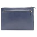 Pochette en cuir navy Coach