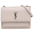 Bolsa Sunset Monogram média em croco rosa Saint Laurent