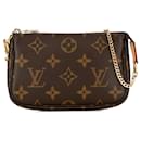 Brown Louis Vuitton Monogram Mini Pochette Accessoires Handbag