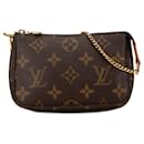 Brown Louis Vuitton Monogram Mini Pochette Accessoires Handbag