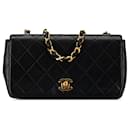 Bolso cruzado de piel de cordero acolchado negro Chanel Mini CC con solapa completa