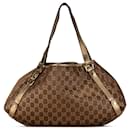 Bolso Tote D Ring Abbey en lona GG marrón de Gucci