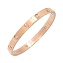 Bracelet Love Cartier en or rose avec diamants