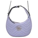 Bolso de hombro de cuero en forma de media luna Gucci GG Marmont