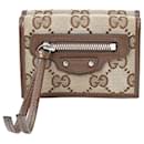 Porte-monnaie en toile GG marron Gucci