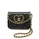 Pochette à chaîne Matelassé Chanel en cuir verni noir