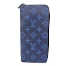 Portefeuille long Louis Vuitton Monogram Shadow Zippy Vertical