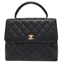 Sac à main en cuir caviar noir Chanel