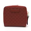 Portefeuille compact Micro Guccissima de Gucci