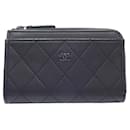 Porte-cartes en cuir noir Chanel