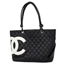 Bolsa tote Chanel Cambon em couro de cordeiro preto e rosa para mulheres