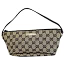 Pochette Gucci in tela GG