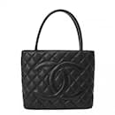 Bolsa tote de couro caviar preto Chanel