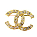 Broche plaquée or Chanel avec strass