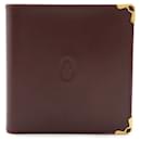 Portefeuille bi-fold Cartier Must en Bordeaux