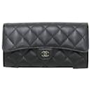 Portefeuille Long Classic Flap Chanel en cuir caviar