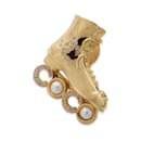 Broche de strass dorado Chanel