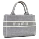 Sac à main en toile noire Miu Miu