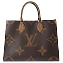 Bolsa tote On the Go MM Monogram Gigante Louis Vuitton