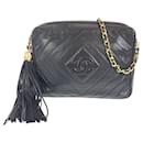 Borsa a tracolla in pelle di agnello vintage Chanel con cuciture a diamante e frange