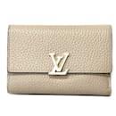 Portefeuille compact tri-fold Capucines de Louis Vuitton