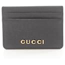 Étui à cartes de visite en cuir noir Gucci