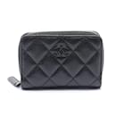 Porte-monnaie zippé classique Chanel en cuir caviar noir