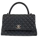 Bolsa de mão Chanel Caviar Skin Matelassé Coco Handle 2 em 1