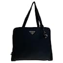 Bolso tote de nylon tessuto con logo triangular de Prada