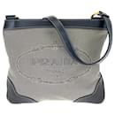 Bolsa de ombro em lona/couro com logo jacquard Prada