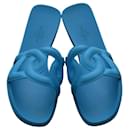 HERMÈS Light Blue Rubber Aloha Flat Slides Sandals 37 with cutout straps - Hermès