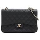 Klassische Double Flap Jumbo Tasche aus schwarzem, gestepptem Kaviarleder mit 2 Möglichkeiten - Chanel